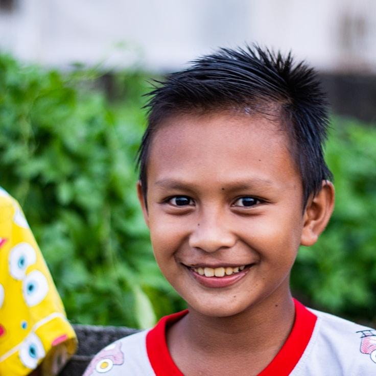 Alex Rivera, Lead Design Curator at HarvestForestMirror, reviewing corporate floral arrangements